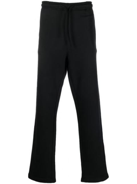 logo-patch track pants by 032C