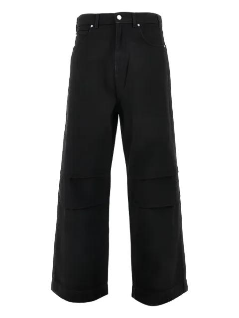Over wide-leg jeans by 1989 STUDIO