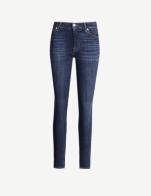Slim Illusion high-rise skinny jeans by 7 FOR ALL MANKIND