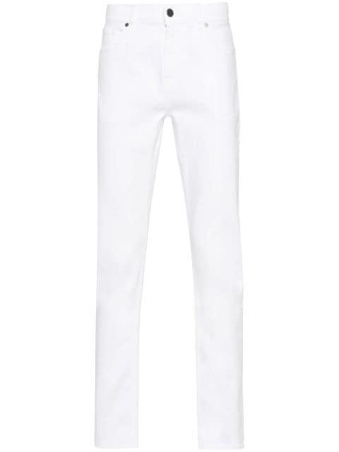 Slimmy mid-rise slim-cut jeans by 7 FOR ALL MANKIND