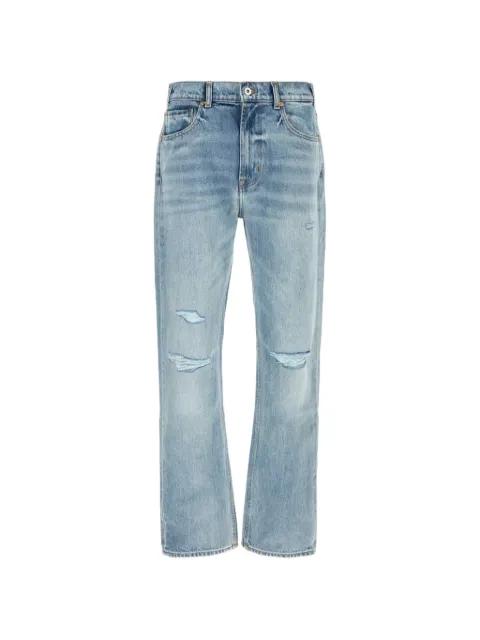 distressed denim jeans by 7 FOR ALL MANKIND