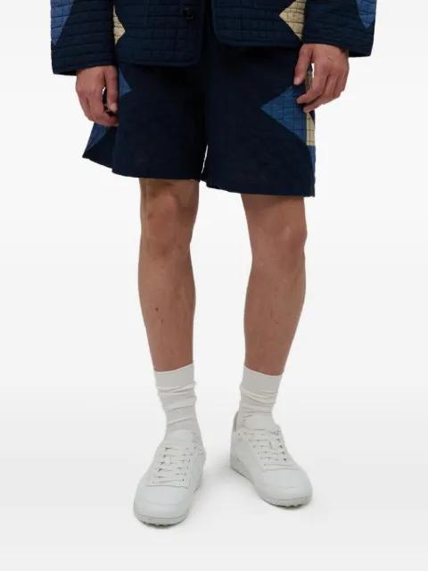 quilted geometric-pattern shorts by A.P.C.