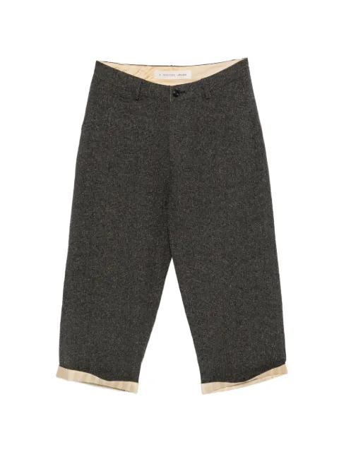 check-pattern buckle-detail trousers by A TENTATIVE ATELIER
