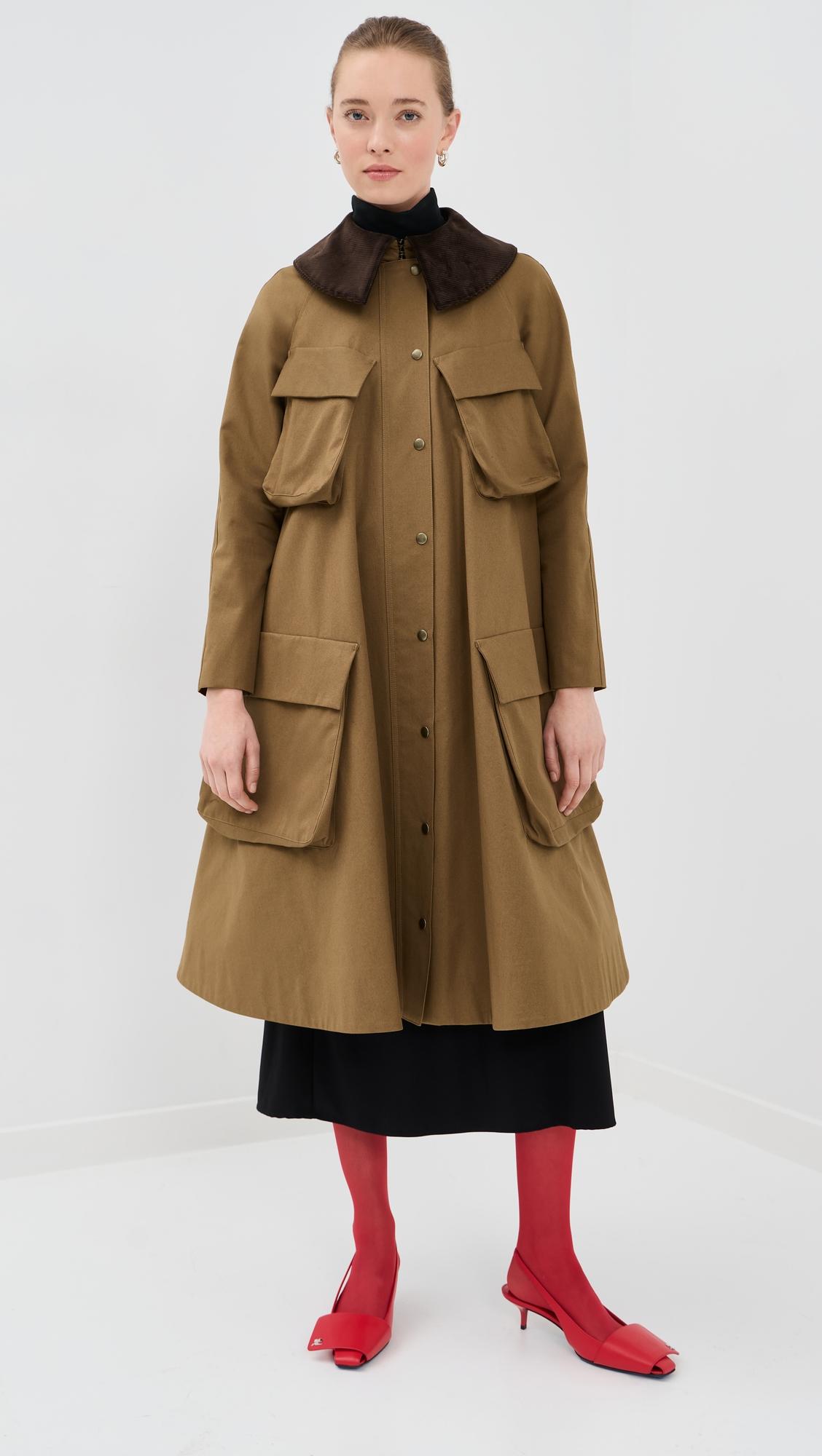 Long Flared Trench Coat by A.W.A.K.E MODE