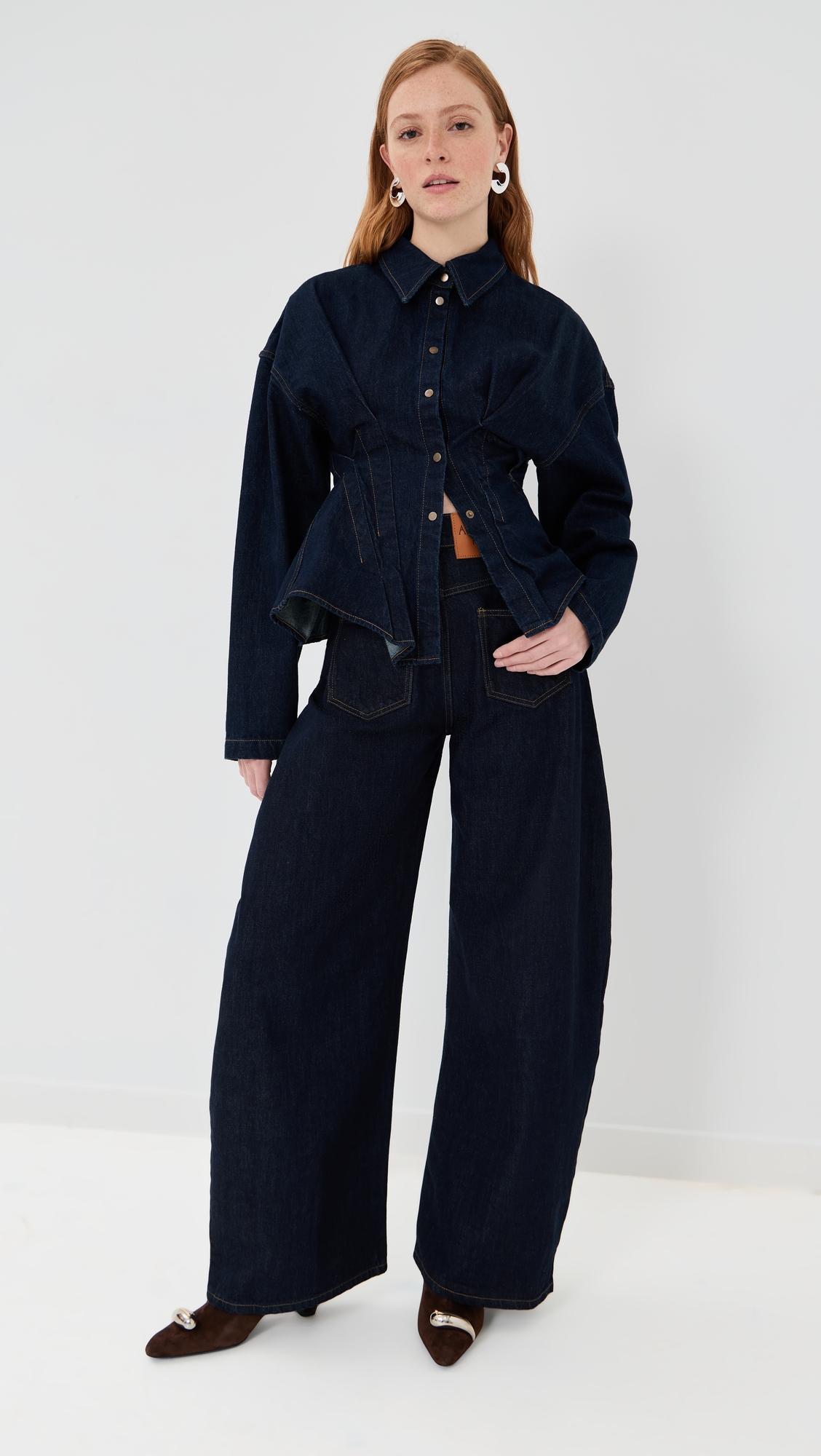 Rounded Rinse Wash Jeans by A.W.A.K.E MODE