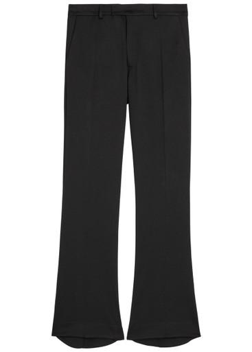 Puddle flared-leg trousers by AARON ESH