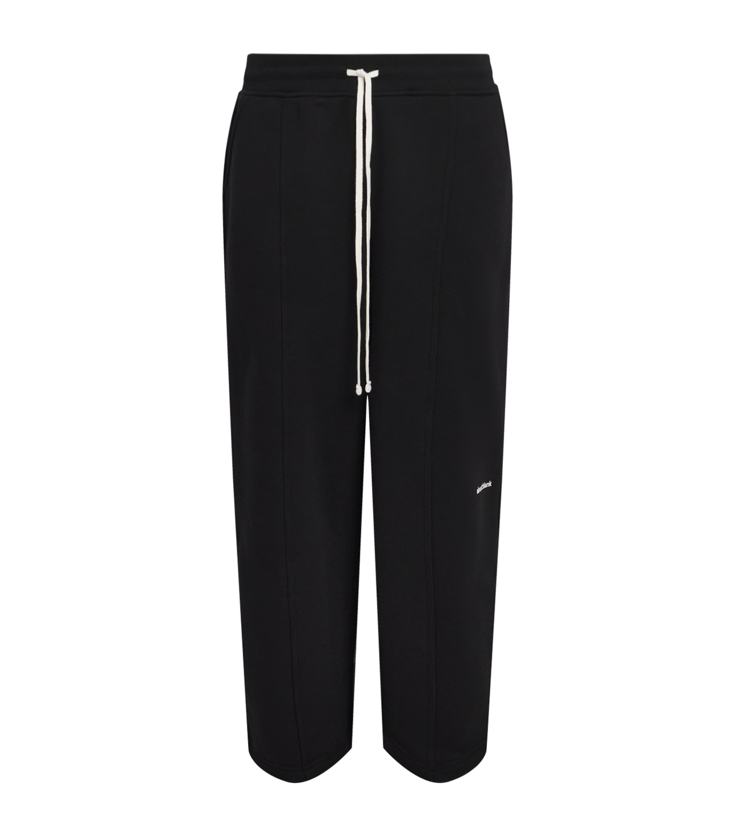 about:blank Cotton Logo Pleated Sweatpants by ABOUT:BLANK