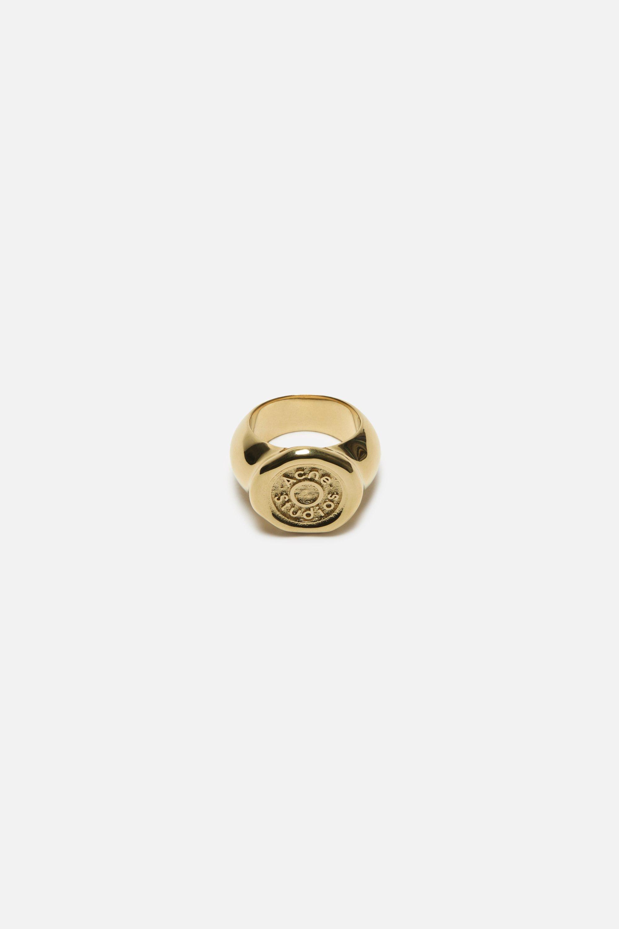 Acne Studios | Logo Stamp Ring | Medium | Gold by ACNE STUDIOS