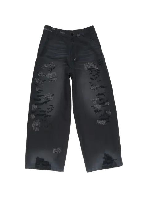 Mended distressed trousers by ACNE STUDIOS