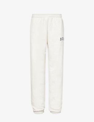 Logo-embroidered tapered-leg organic-cotton jogging bottoms by ADANOLA