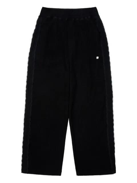 fringed detal trousers by ADER ERROR