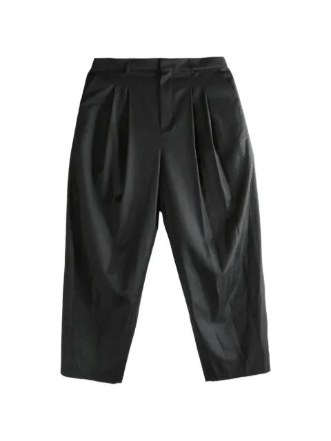 pleated trousers by ADER ERROR