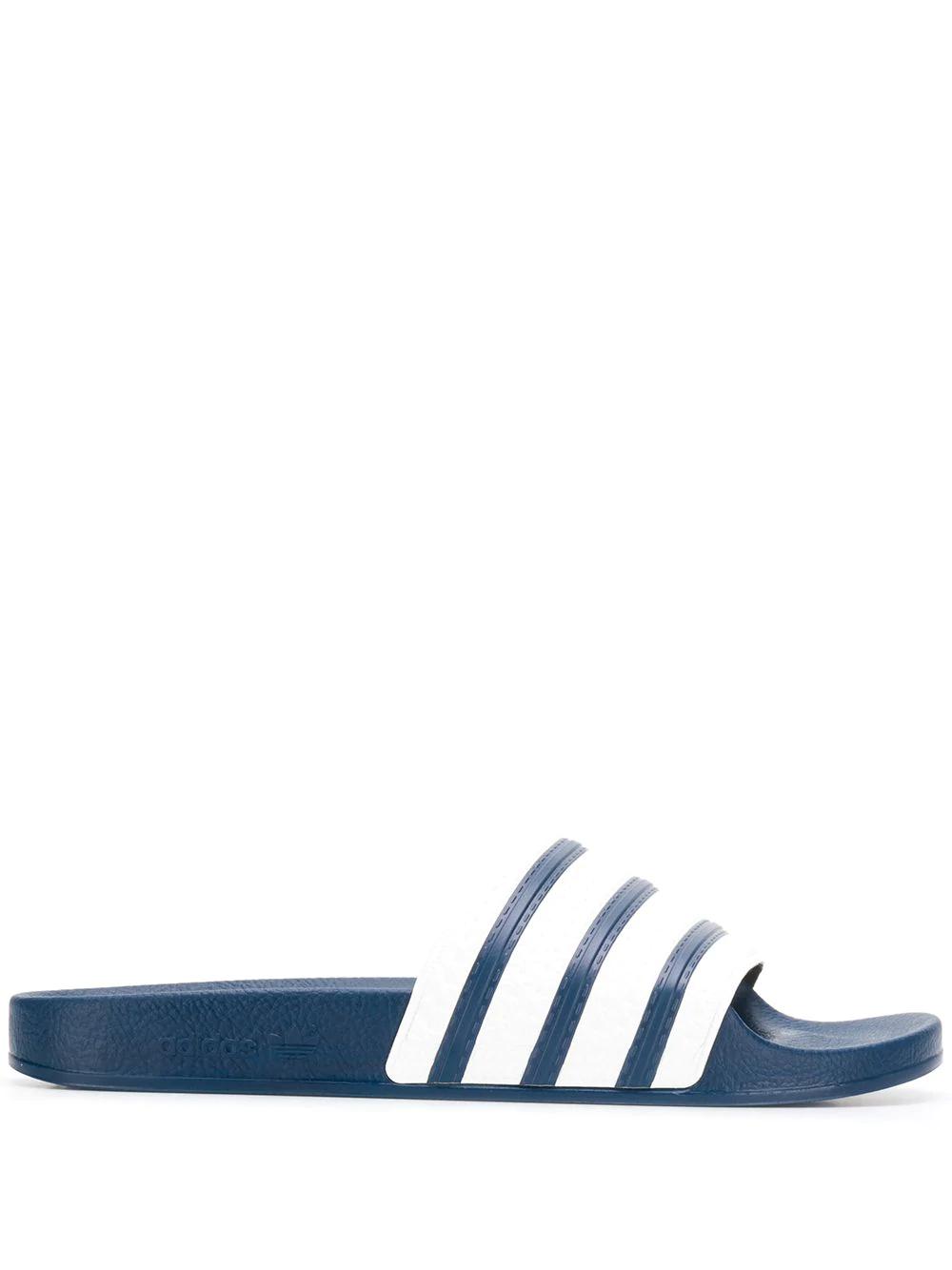 Adilette slides by ADIDAS