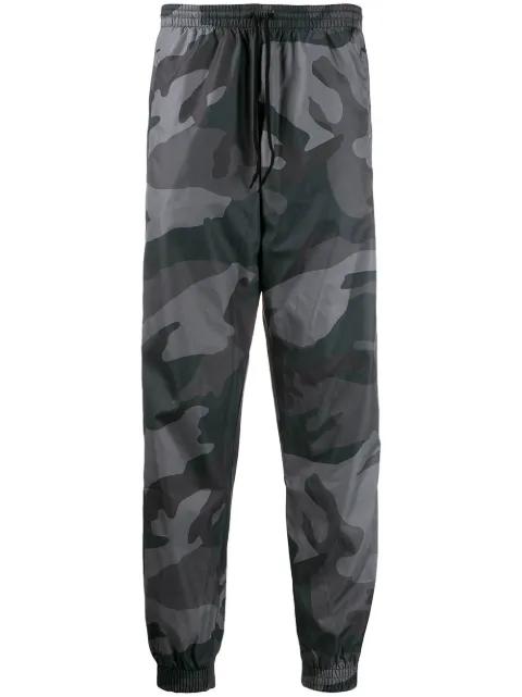 Camouflage track trousers by ADIDAS