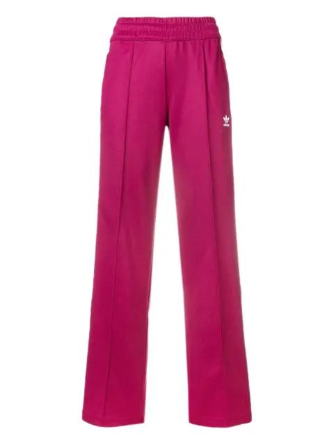Contemporary stripe track pants by ADIDAS