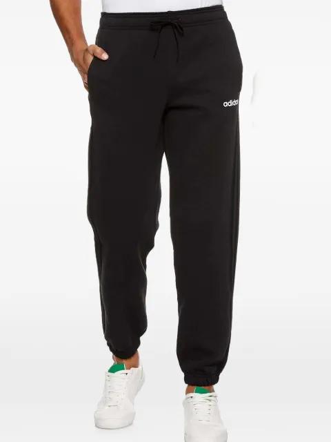 Essentials 3 Stripes fleece track pants by ADIDAS