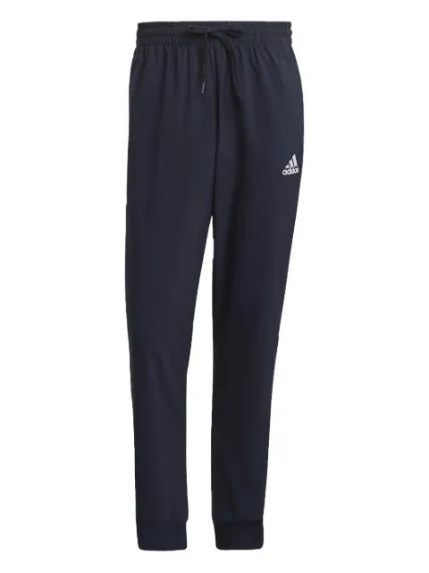 Essentials 3-stripes track pants by ADIDAS