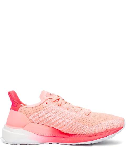 Solar Boost 19 "Light Flash Orange" sneakers by ADIDAS