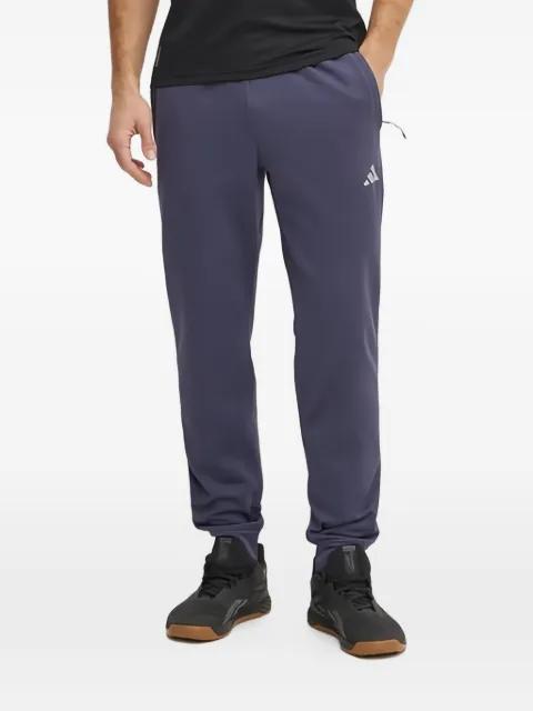 logo-pattern track pants by ADIDAS