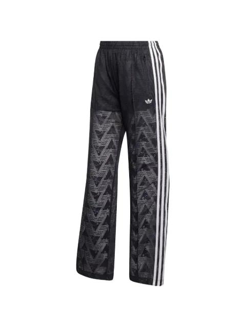 stripe patterned track pants by ADIDAS