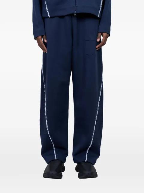 x Arte Antwerp embossed-logo track pants by ADIDAS
