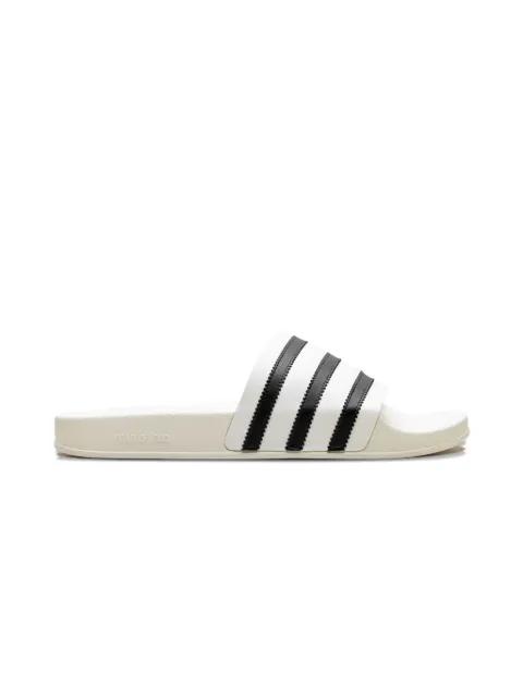 x Fear of God Athletics Adilette "Cream White" slides by ADIDAS