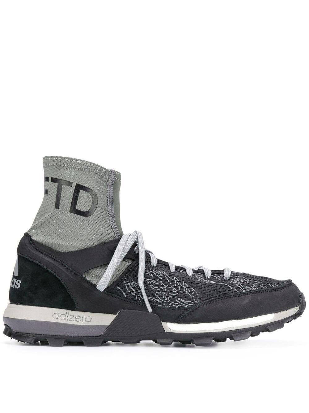 x Undefeated Adizero XT Boost sneakers by ADIDAS
