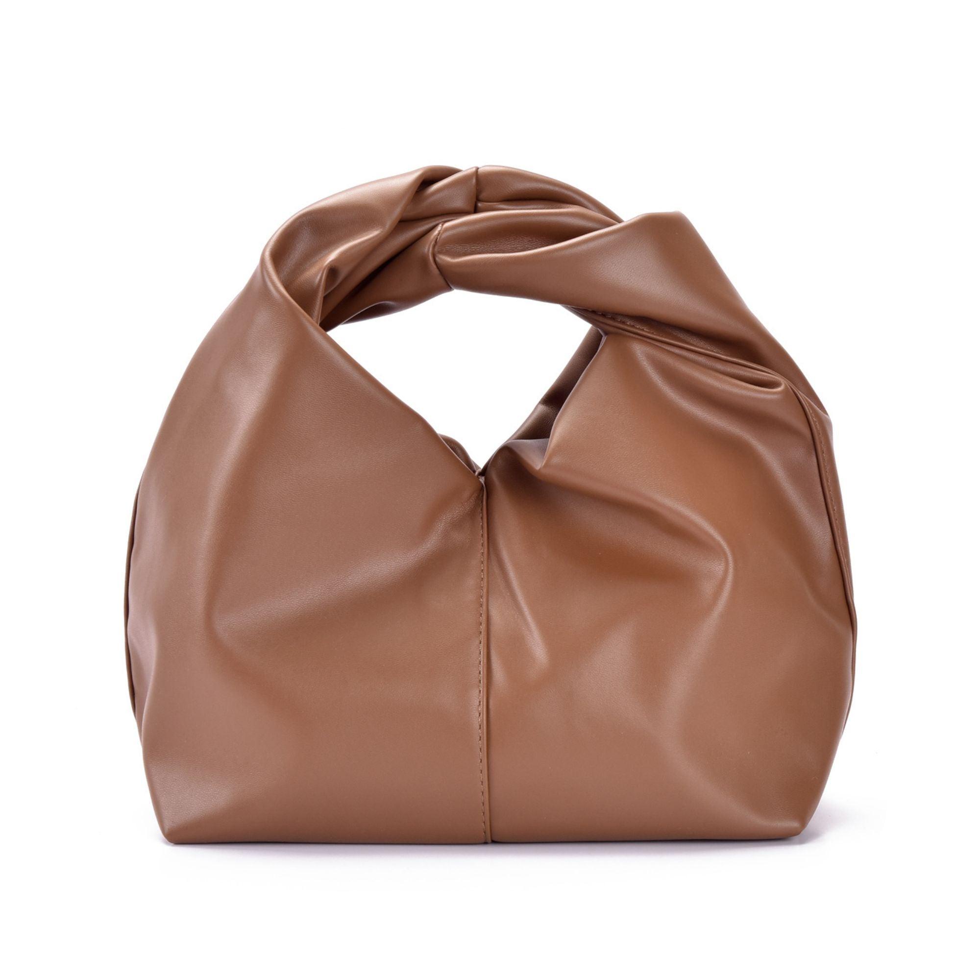 Rust Slouchy Twist Bag by ADORNIA
