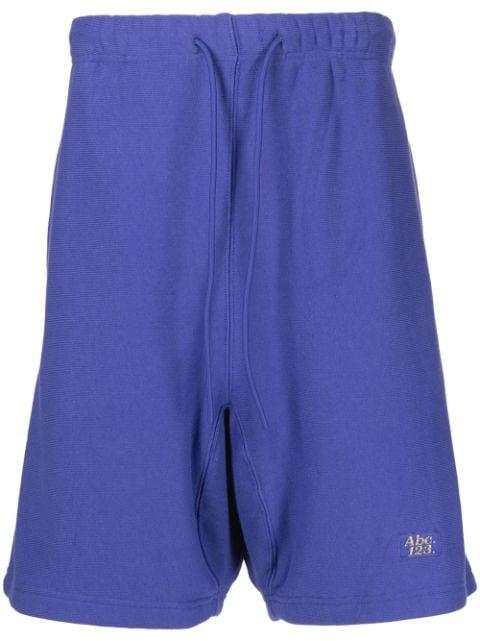 logo-embroidered cotton track shorts by ADVISORY BOARD CRYSTALS