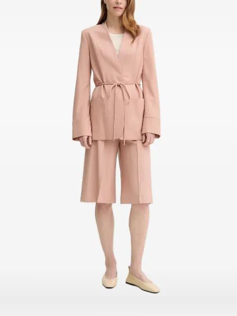 belted pocketed single-breasted coat by AERON