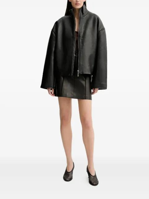 button-fastening leather mini skirt by AERON