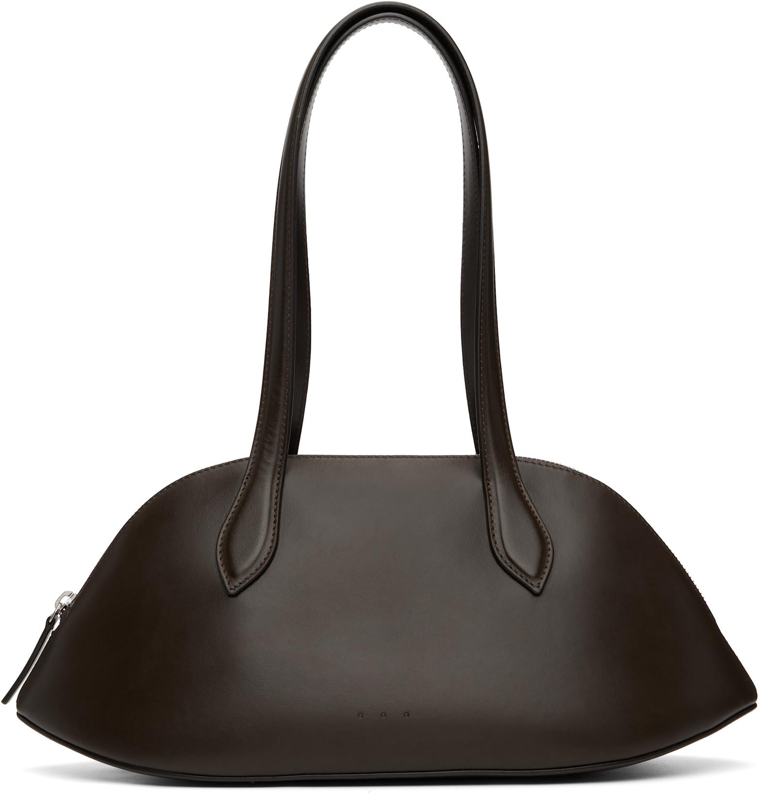 Brown Cosmo Bowling Bag by AESTHER EKME