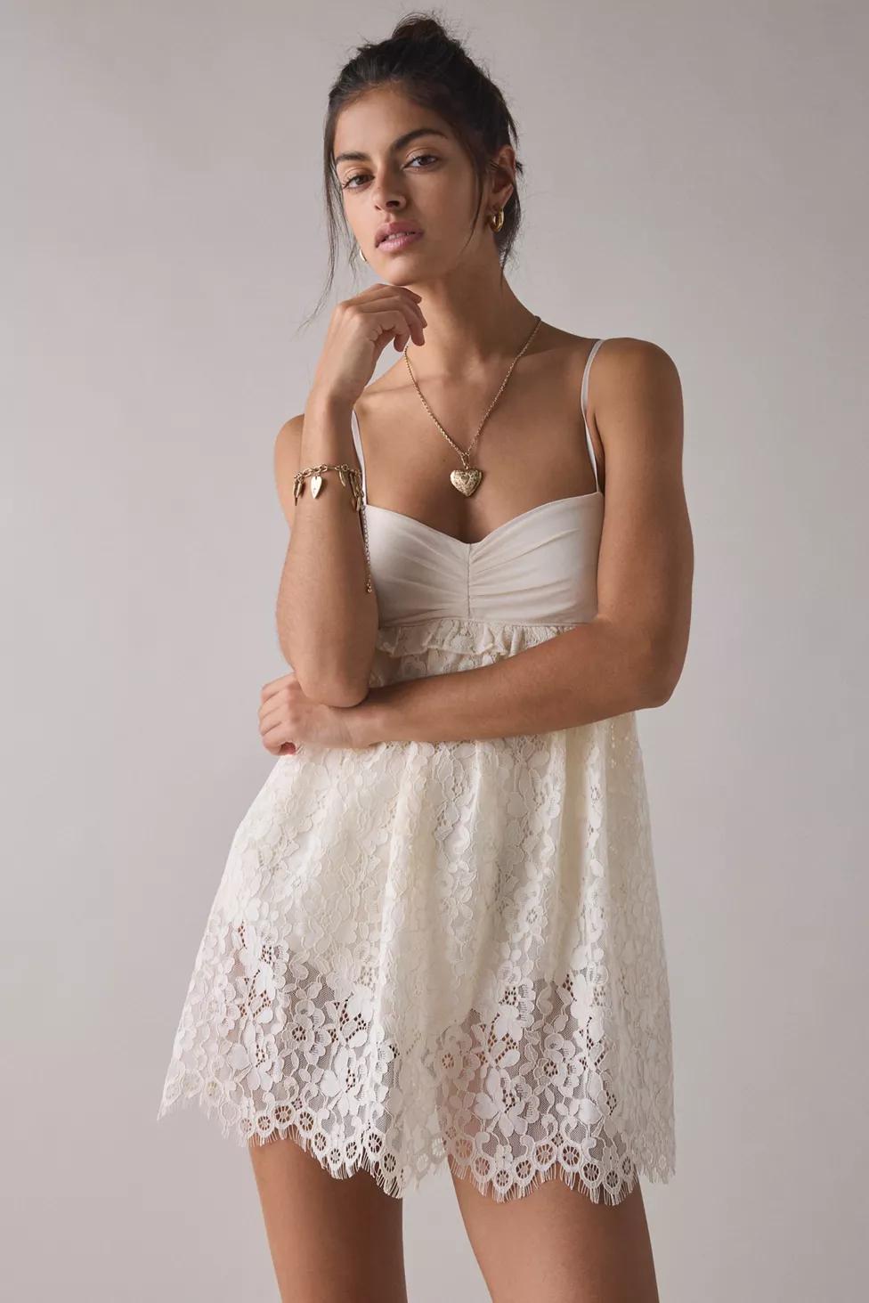 AFRM Aria Sheer Scalloped Lace Babydoll Mini Dress by AFRM AFRM Aria Sheer Scalloped Lace Babydoll Mini Dress by AFRM