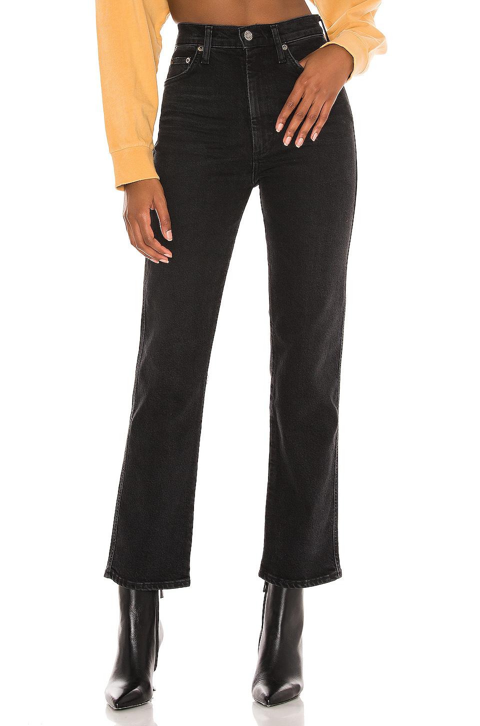 AGOLDE Pinch Waist High Rise Kick Flare Jeans in Black by AGOLDE