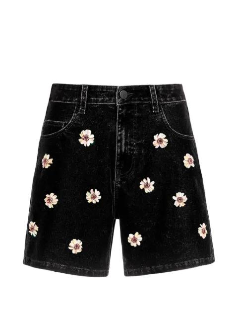 Dahlia flower-embellished denim shorts by AGUA BENDITA