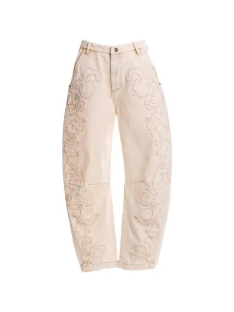 Fallon distressed floral-embroidery jeans by AGUA BY AGUA BENDITA