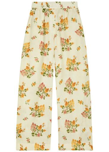 Tota floral-print linen trousers by AGUA BY AGUA BENDITA