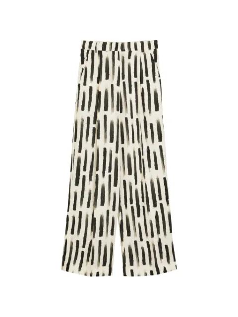brush-stroke print trousers by AKYN
