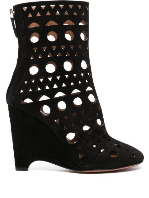 105mm cut-out leather boots by ALAIA