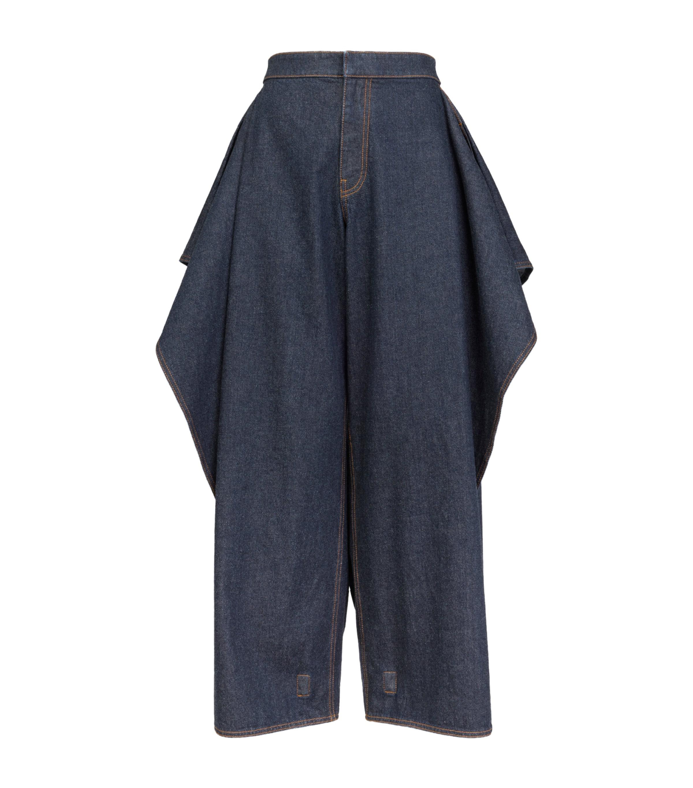 Alaïa Flap Open-Leg Jeans by ALAIA