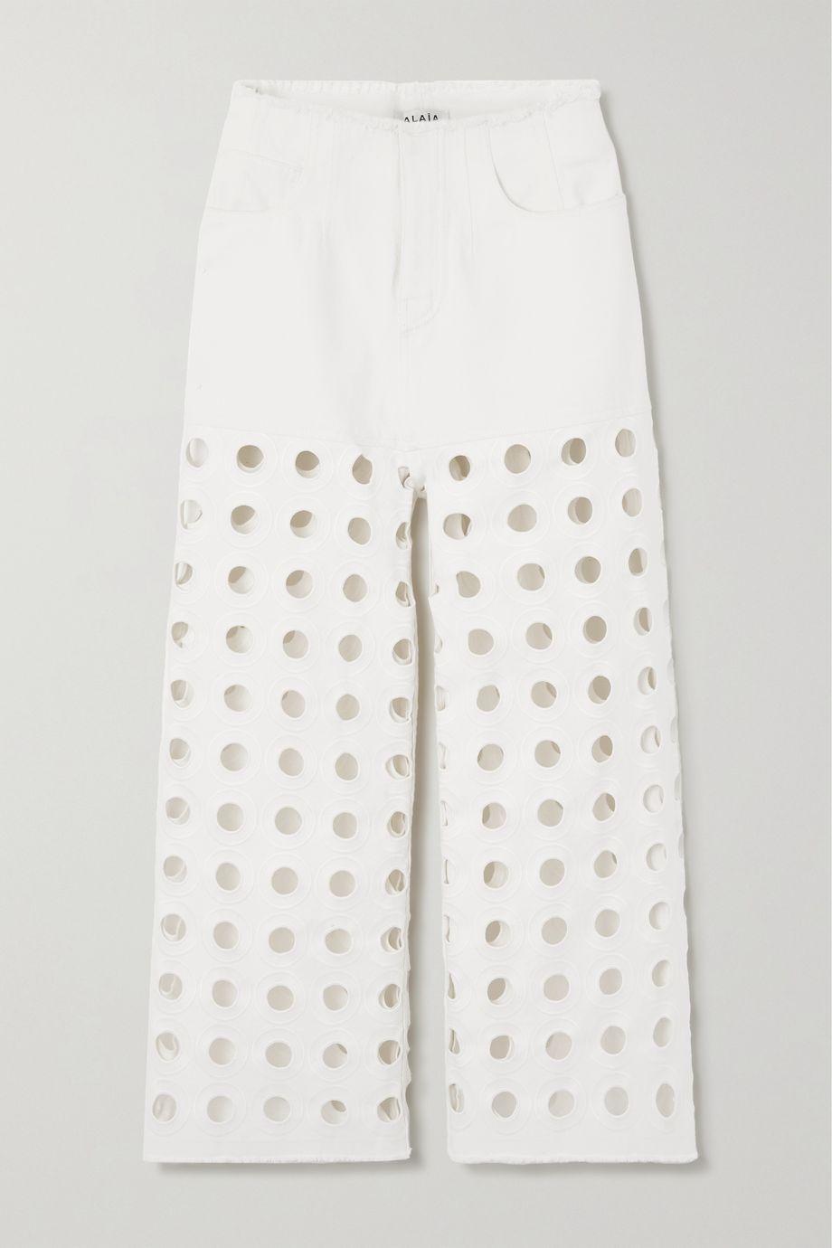 Embroidered laser-cut frayed low-rise jeans by ALAIA
