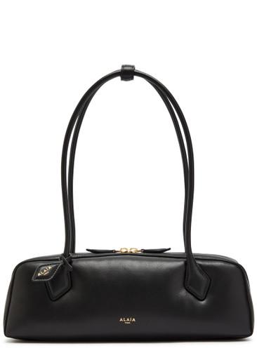 Le Teckel medium grained leather shoulder bag by ALAIA