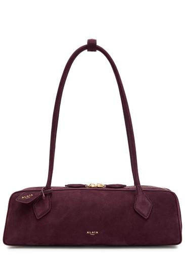 Le Teckel medium suede shoulder bag by ALAIA