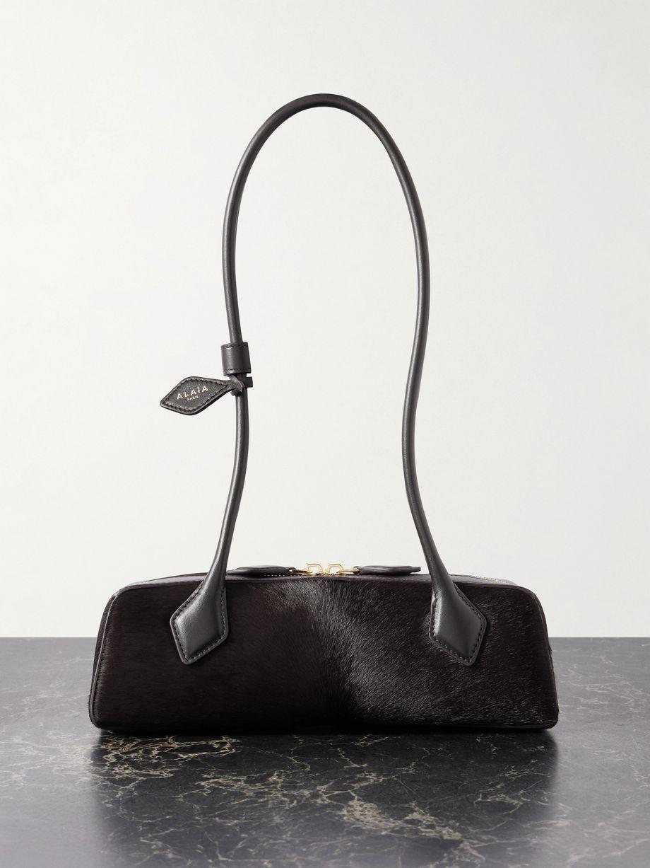 Le Teckel small leather-trimmed calf hair shoulder bag by ALAIA