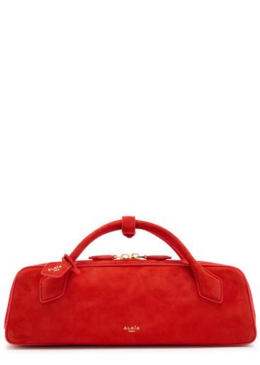 Le Teckel suede clutch by ALAIA