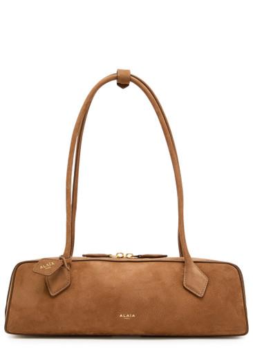 Le Teckle medium grained nubuck shoulder bag by ALAIA
