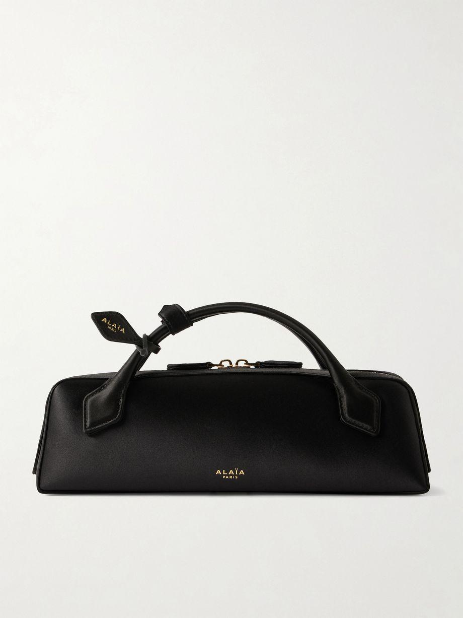 Le Teckle satin clutch bag by ALAIA
