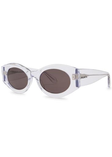 Oval-frame sunglasses by ALAIA