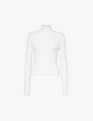 Ribbed turtleneck wool-blend top by ALAIA