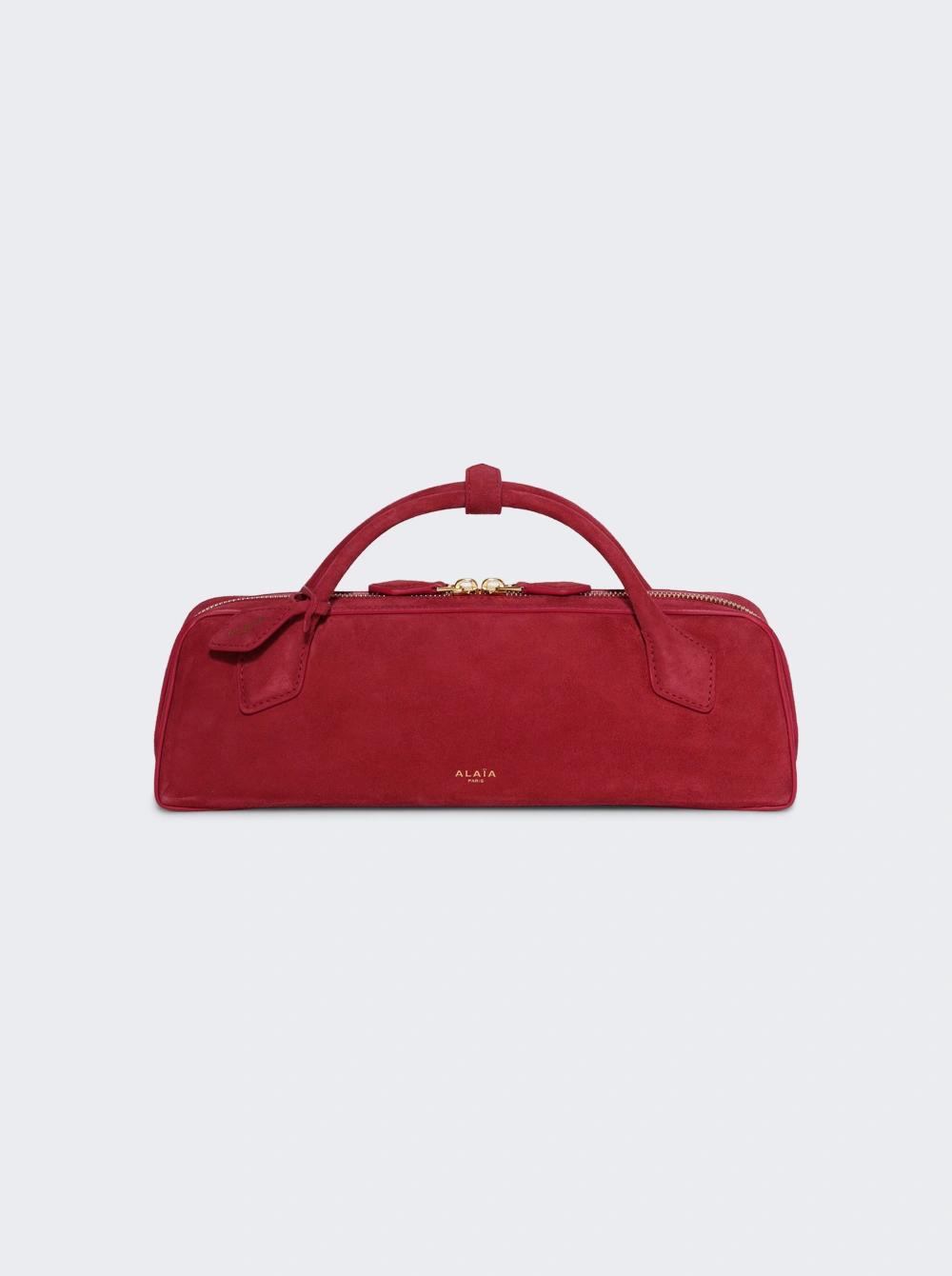 Teckel Clutch In Suede Framboise Red  | The Webster by ALAIA